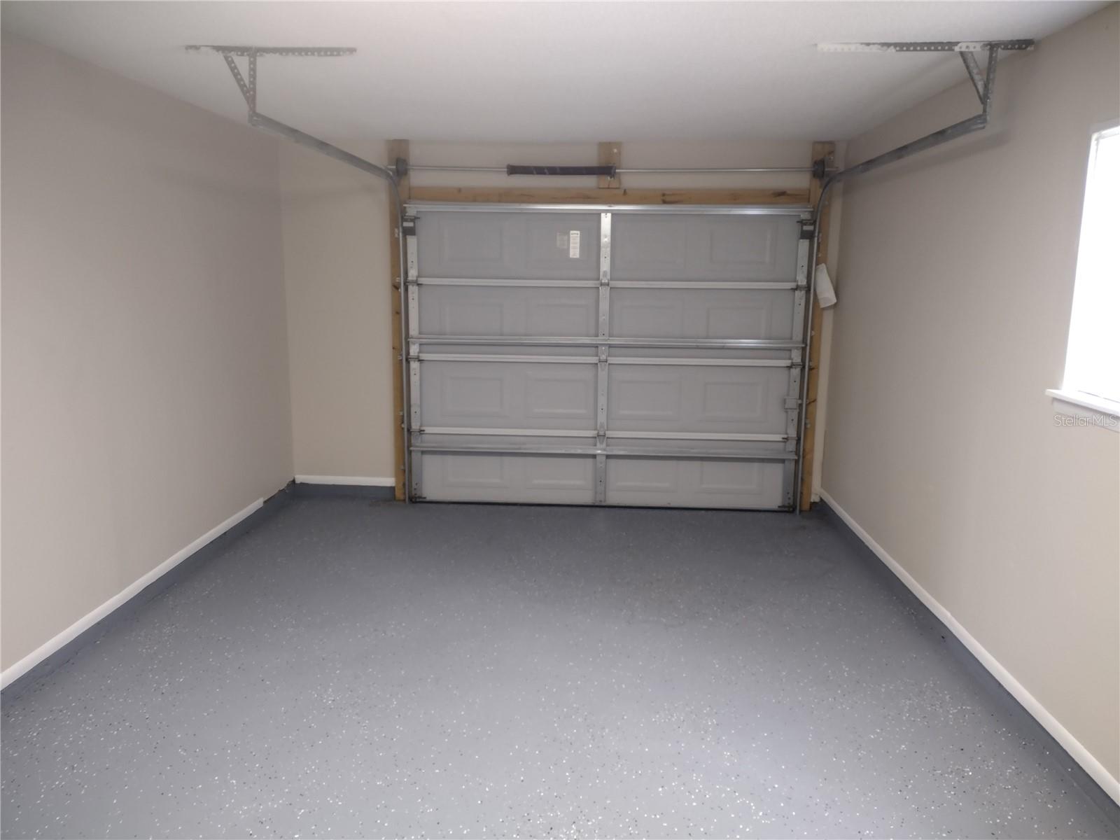 New Garage Door and Epoxy Floor Treatment