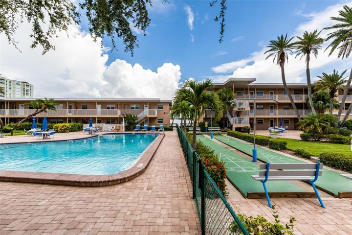 2nd pool (not heated) & shuffleboard by the grilling area.