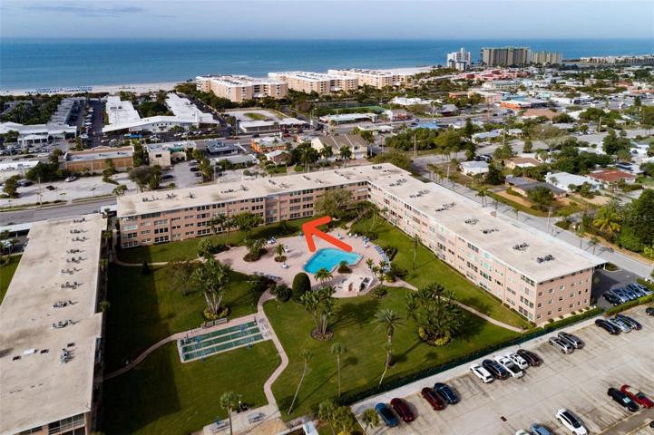 Unit w/bay, tropical & pool views.