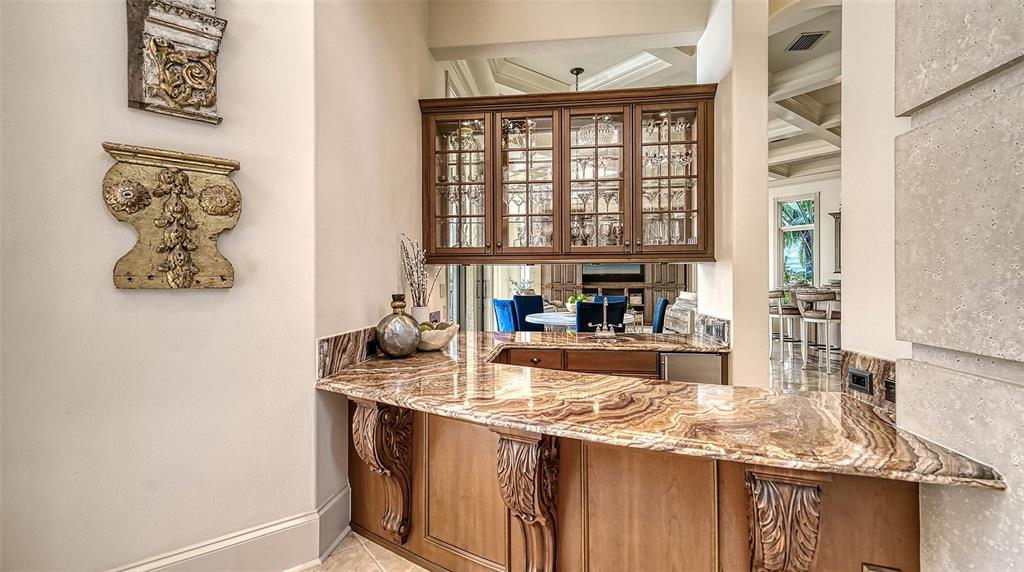 Wet bar between the living room and kitchen