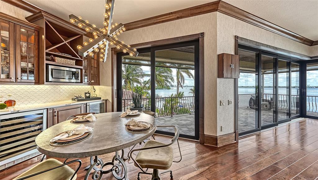 Bar with microwave, wine cooler, beverage cooler and refrigerator