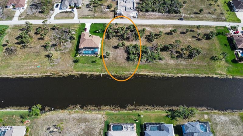 Canal front extra deep lot.
