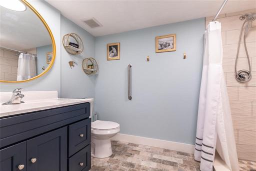 New vanity, sink, toilet, flooring