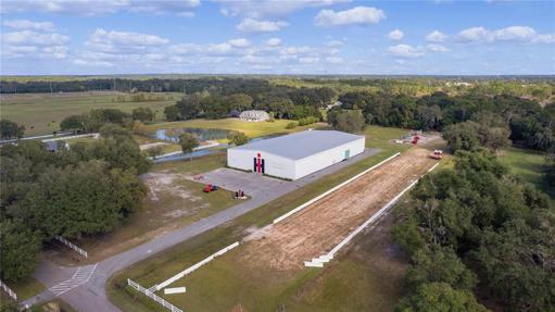 22,000 square foot building  tractor pull track next to building