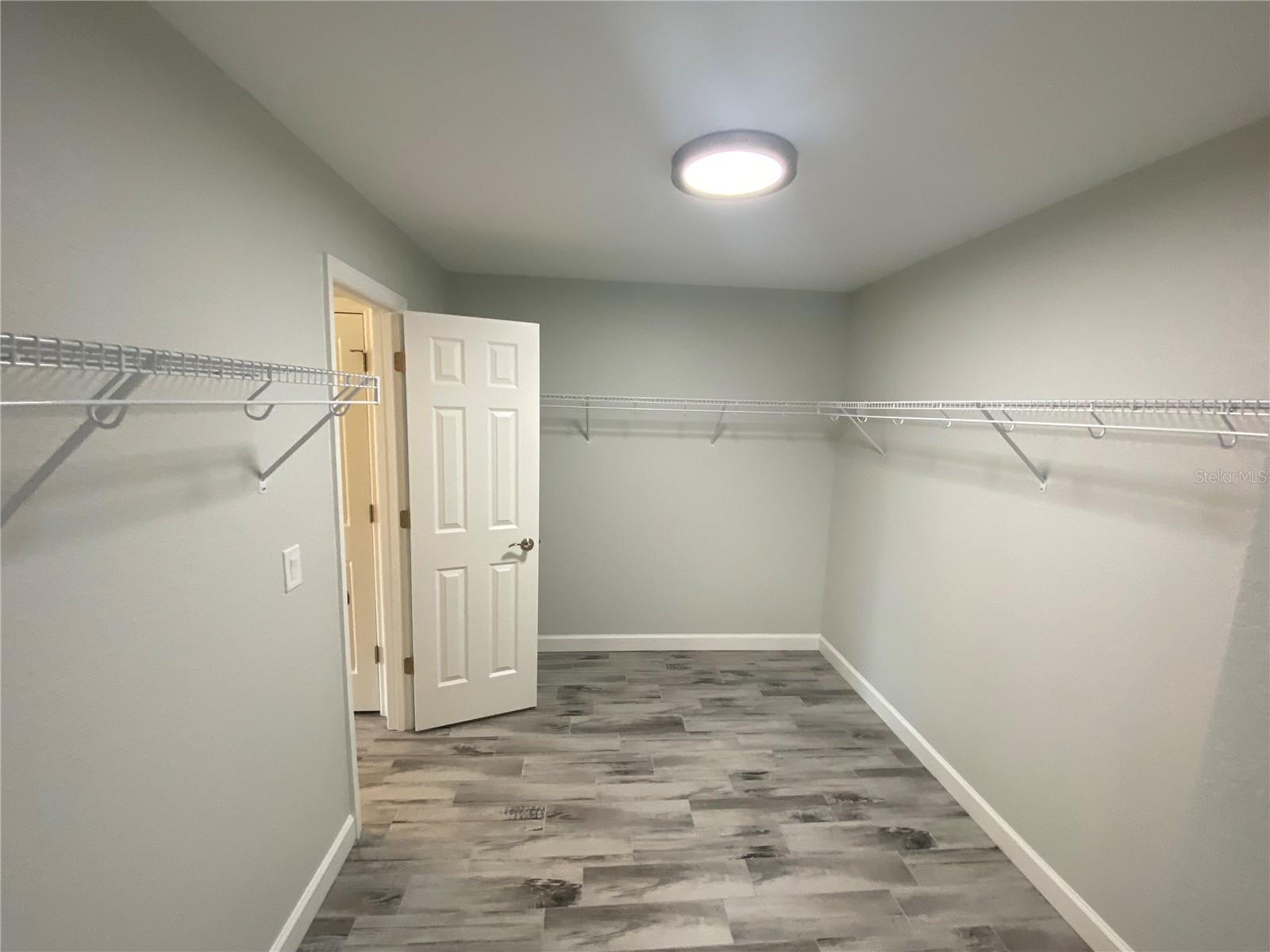 Master Walk In Closet Connects to Laundry