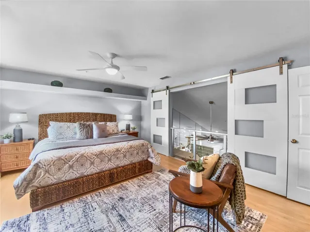 Main bedroom upstairs with water view and ensuite bathroom