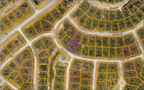 Aerial view; lot is outlined in purple.