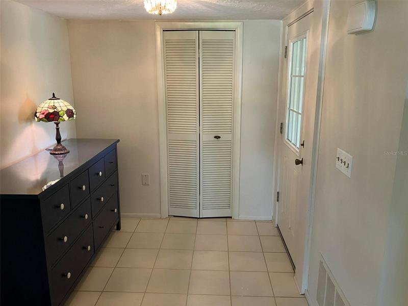 Foyer entrance with hall closet
