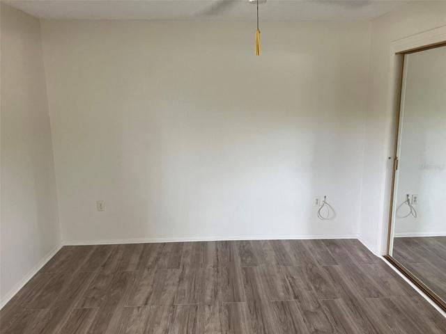 Main bedroom with new laminate plank flooring