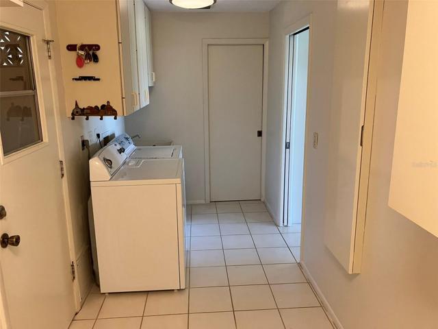 Guest bedroom with new laminate plank flooring