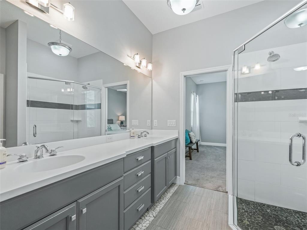 Dual sinks walk-in shower