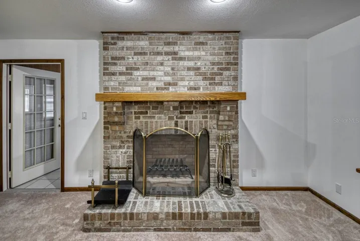 Family room wood burning fireplace
