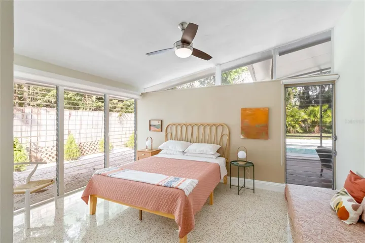 Master bedroom with views of the pool