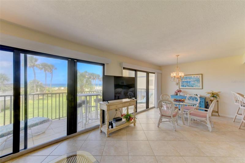 Living Room With Flat Screen TV And Gulf View!