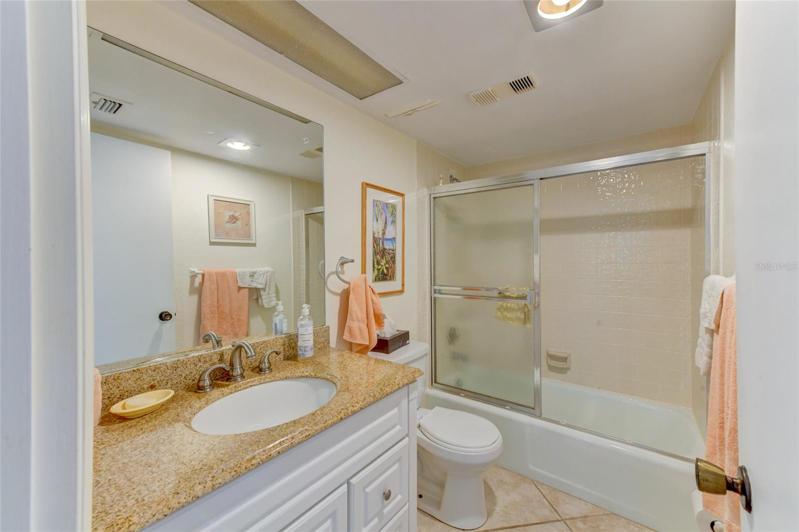 Master Bathroom With Tub And Shower.