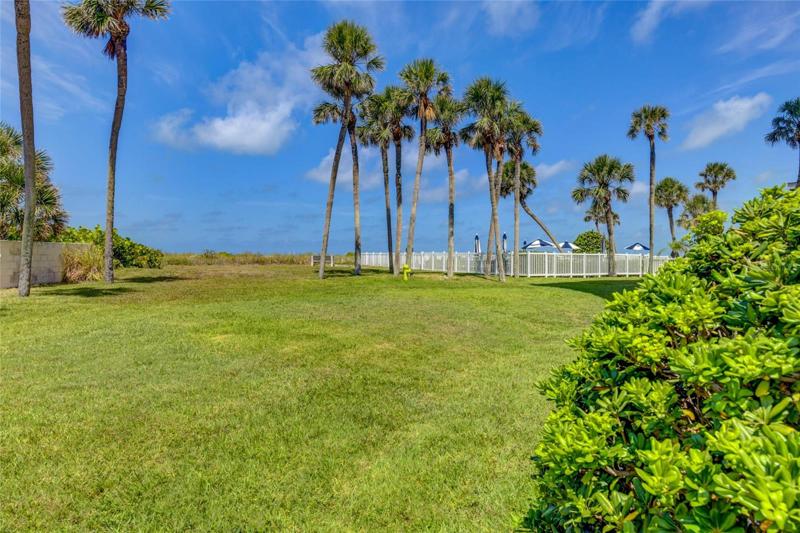 Lawn And Pool Area Just Steps From The Condo!