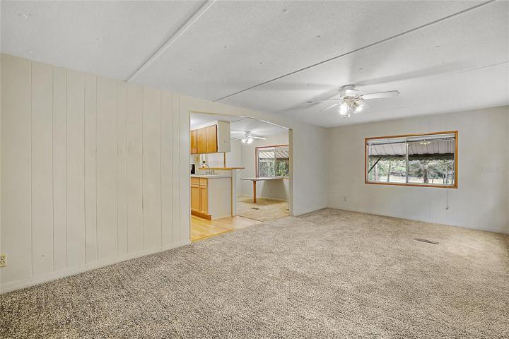 Living Area leading to Kitchen Area