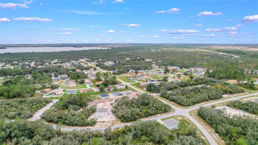This section of Poinciana is taking shape with homes being built all around this spacious lot so now is the time to create and build your perfect home!