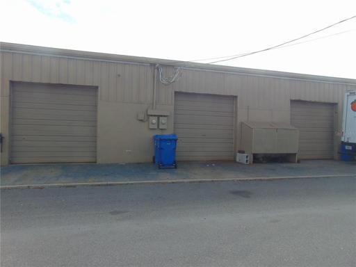 Rear stalls leading onto the access road.