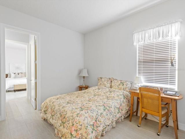 One of two bedrooms that share jack and jill bathroom.