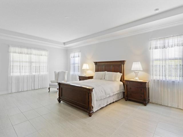 Master bedroom with plenty of space, tray ceilings, extremely spacious walk-in closets.