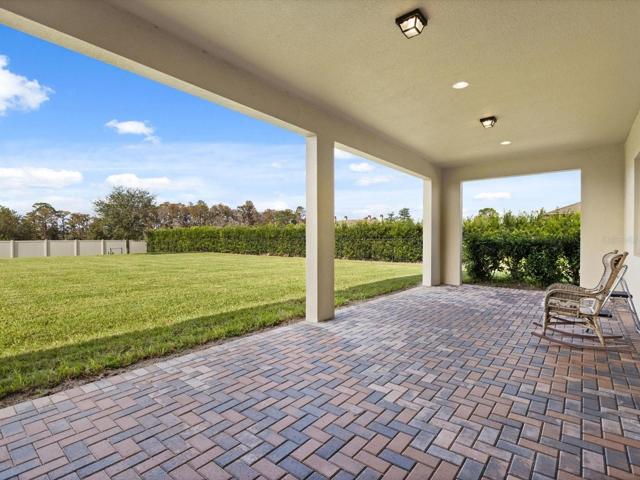 Oversized lanai, with plenty of space to add a pool down the road and still have a large yard.