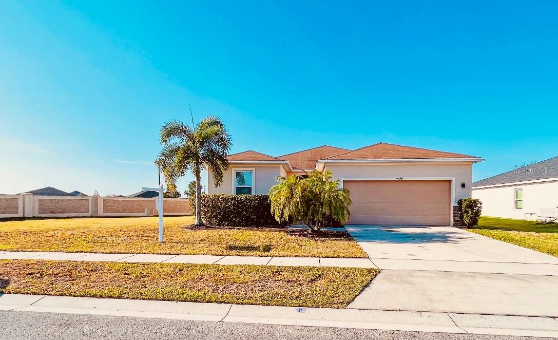 Front exterior with oversized lot
