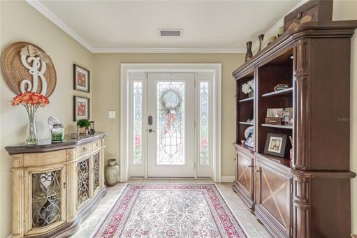Large Foyer with 19x19 Porcelain Tile