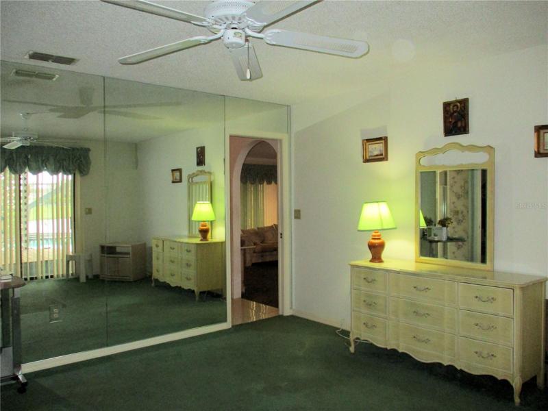View of range and kitchen cabinets