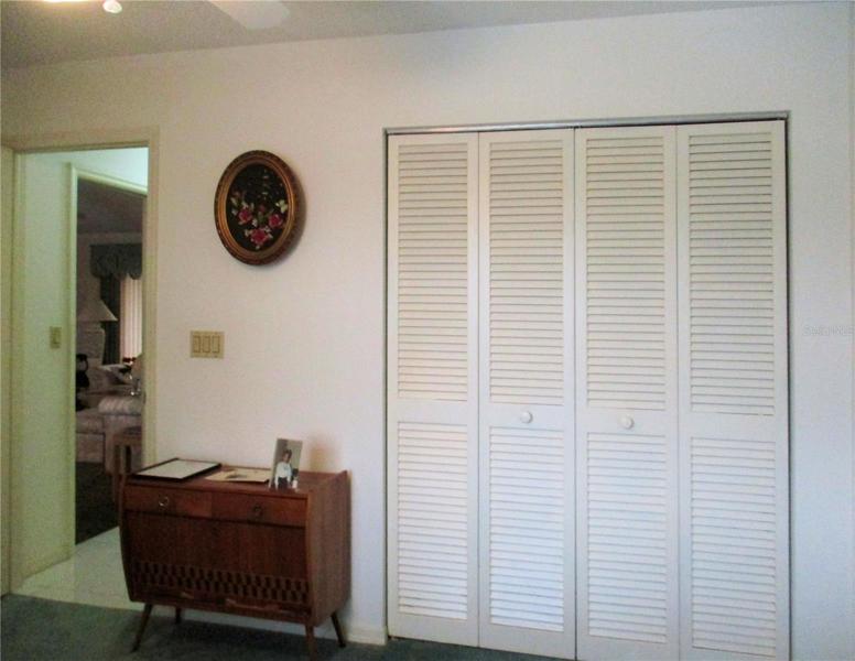 Double closet in third bedroom