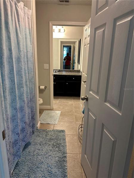3rd bath shared with 4th bedroom