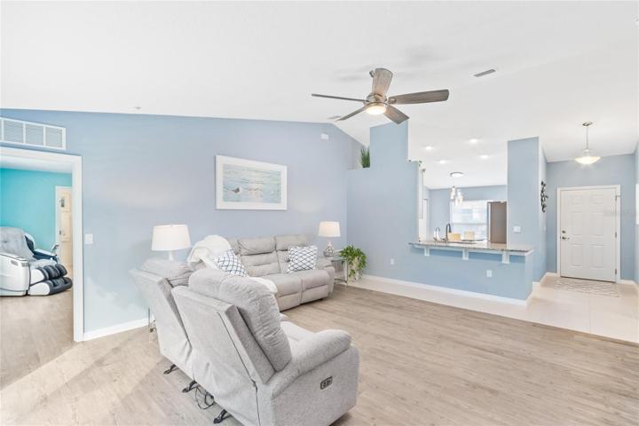 Living room with view into Master bedroom.