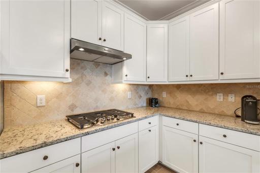 Kitchen boasting a gas stove