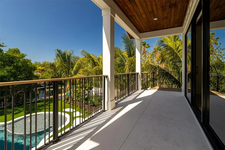 LIVING ROOM BALCONY OVERLOOKING POOL