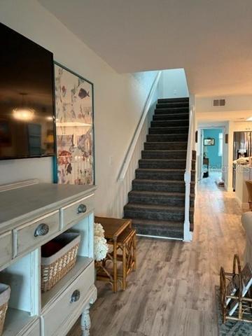 Stairs to master bdrm- guest- laundry