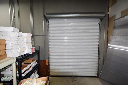 10' roll up door with storm shutter