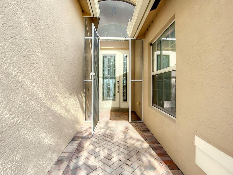 Walk up and see leaded glass entry door