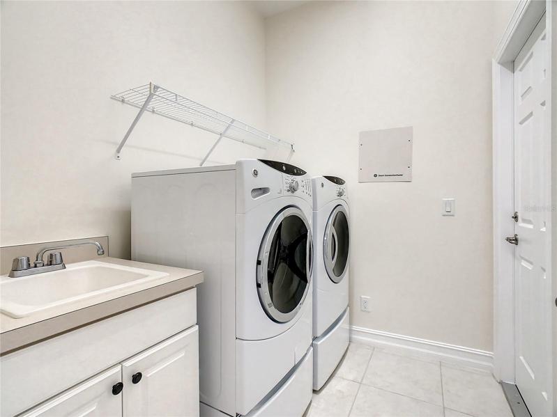 Laundry with sink and washer/dryer