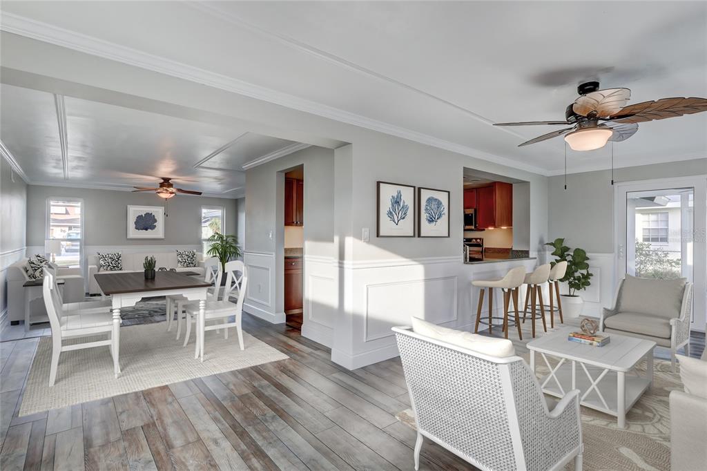 Virtually Staged Dining Room and Family Room Area