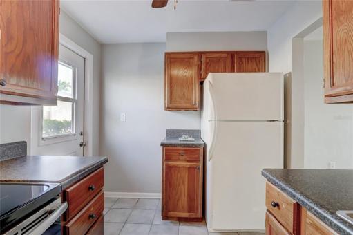 Virtually Stages Mother In Laws Quarters Living Room/Dining Area
