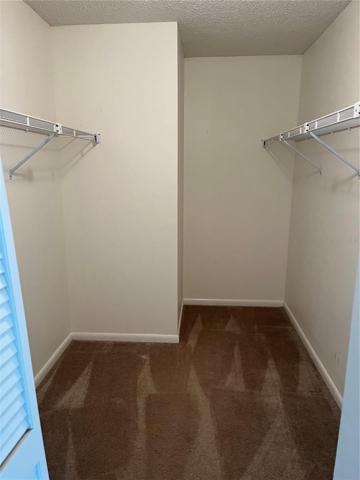 MAIN BEDROOM WALK IN CLOSET