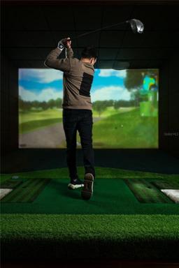 Golf simulator in Sports Lounge