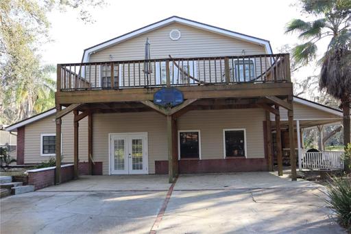 Side with parking and 2nd floor master balcony