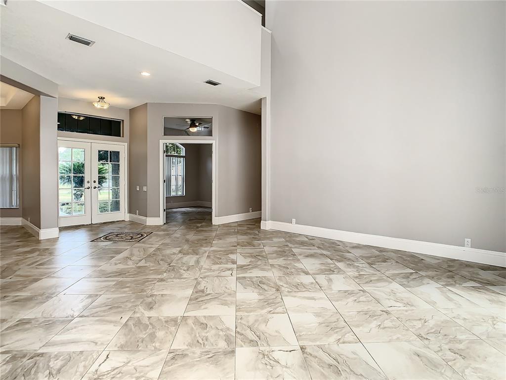 Living room , office on right, dining on left