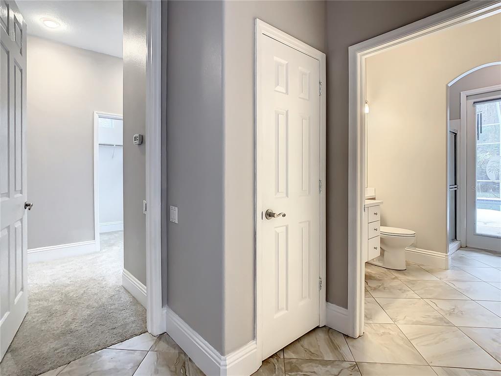 Pool bath and door way to master bedroom