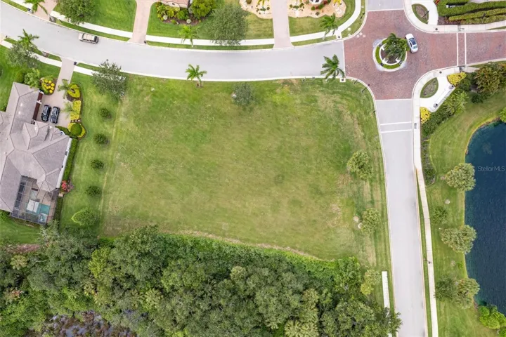 Nestled among large estate homes with conservation behind for tremendous privacy.