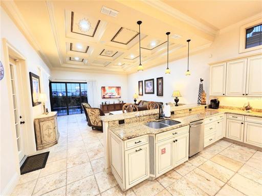 Living Room (18x22) Corner Sliding Glass Doors leading to Pool Area. Tray Ceilings with Faux