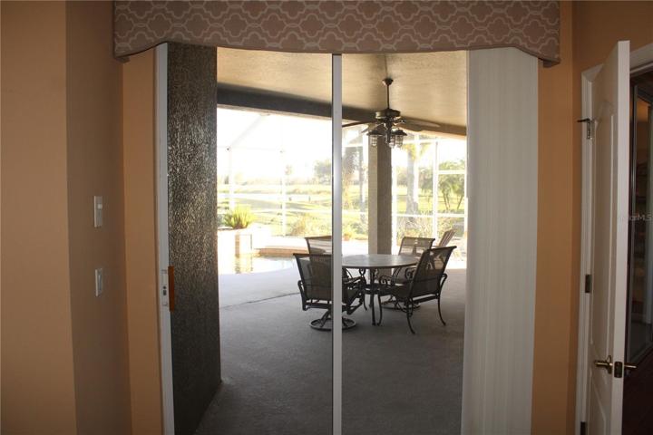 Master Bedroom overlooking pool and golf course