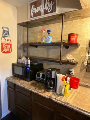 Industrial shelving at the coffee bar area