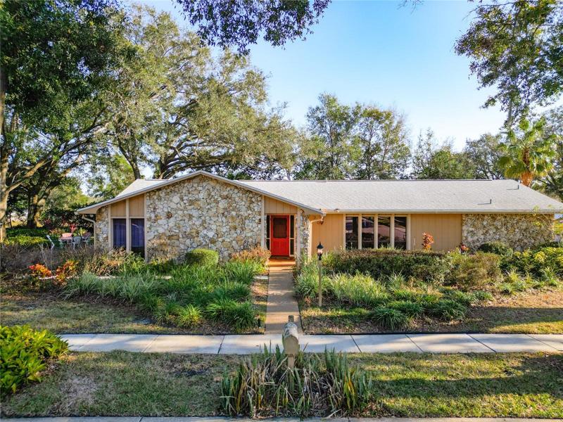 Stone, block and double stucco home with new roof in 2022